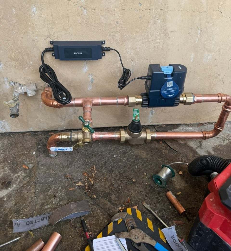 Smart automatic water shutoff and leak detection valve installed on a copper main water line